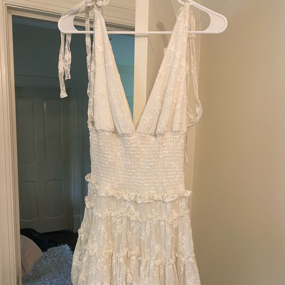 Super cute lace mini dress with tie straps